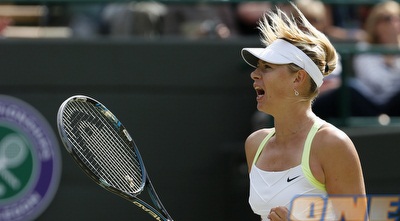 שראפובה לאחר עוד ניצחון על הדשא של ווימבלדון (GettyImages)