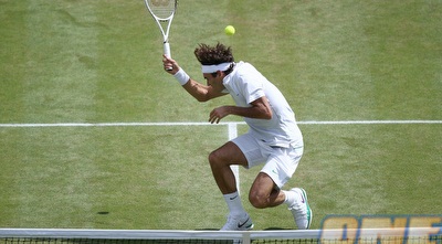 פדרר מתחבא מהכדור (רויטרס)