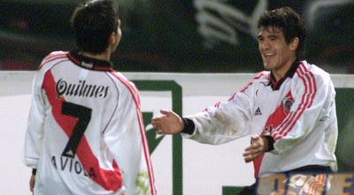 אורטגה וסביולה חוגגים במדי ריבר (רויטרס)