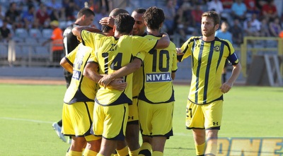 שחקני מכבי ת&qout;א חוגגים. אולי בעוד 10 שנים אפשר יהיה לדבר על זה? (עמית מצפה)