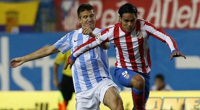 דראמל פלקאו עוקף את איגנאסיו קאמאצ´ו (רויטרס) דראמל פלקאו עוקף את איגנאסיו קאמאצ´ו (רויטרס)