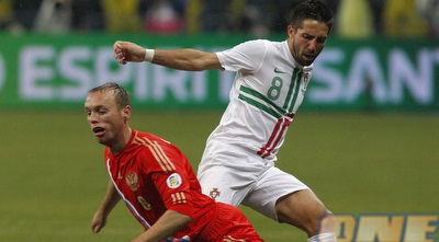 ז´ואו מוטיניו מול דניס גלושקוב (רויטרס) ז´ואו מוטיניו מול דניס גלושקוב (רויטרס)