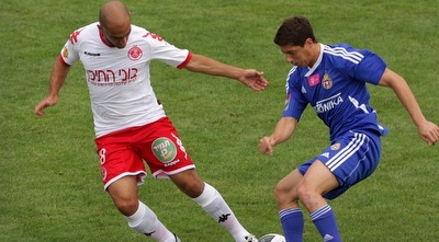 מאור מליקסון מול שי אבוטבול. שחקני הפועל ייעצו לא להגיע למכבי