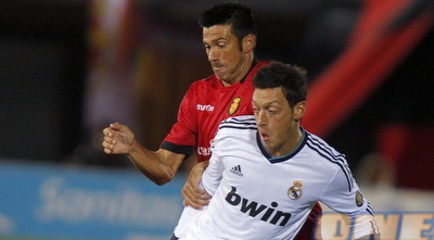 אוזיל נאבק עם ארסימנדי (רויטרס)