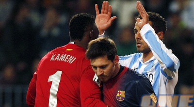 קאמני מנחם את מסי המאוכזב (רויטרס)