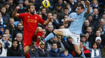 מילנר ואנריקה נאבקים (רויטרס) מילנר ואנריקה נאבקים (רויטרס)