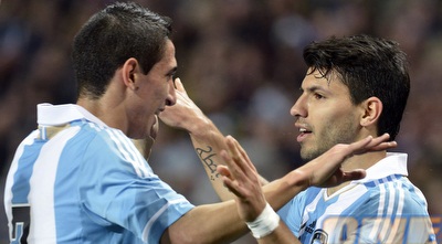 אגוארו ודי מריה חוגגים (רויטרס)