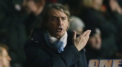 מנצ´יני עצבני. עיתוי מושלם לפרסום הדיווחים (רויטרס)