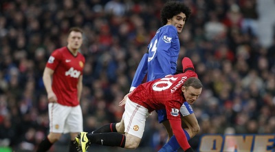 מרואן פלאיני מעיף את וויין רוני (רויטרס)