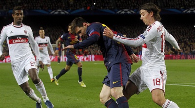 ריקרדו מונטוליבו צמוד לליאו מסי (רויטרס)