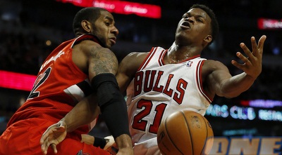 אלרידג´ עוצר את באטלר בדרך לסל (רויטרס)