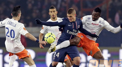 מרקו וראטי בין שלושה שחקני מונפלייה (רויטרס)