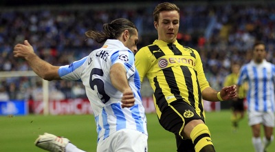 מריו גצה מנסה לעצור את מרטין דמיצ´ליס (רויטרס)