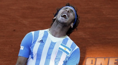 חואן מונקו בטירוף אחרי שניצחון על ז´יל סימון (רויטרס)