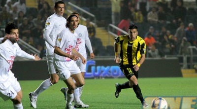 אבי ריקן (יניב גונן)