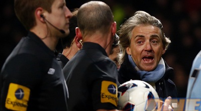 מנצ´יני בא בטענות לשופט עם הירידה להפסקה (רויטרס)