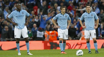 שחקני סיטי מאוכזבים (רויטרס) שחקני סיטי מאוכזבים (רויטרס)