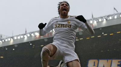 מיצ´ו חוגג באולד טראפורד (רויטרס)