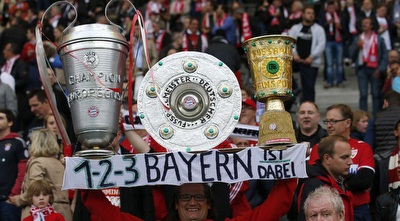 אוהדי באיירן בדרך לטרבל (רויטרס)