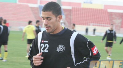 אבי מלכה. בדרך חזרה לב&qout;ש? (משה חרמון)