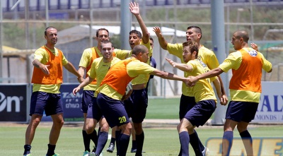 שחקני מכבי באימון (יניב גונן) שחקני מכבי באימון (יניב גונן)