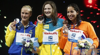 קמפבל, סיושטרום וקרומוידג´וג´ו עם המדליות (רויטרס)