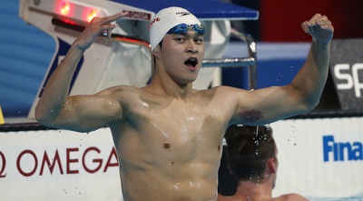 סון יאנג עם הזהב (רויטרס) סון יאנג עם הזהב (רויטרס)