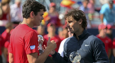 נדאל לוחץ יד לראוניץ´ (רויטרס)