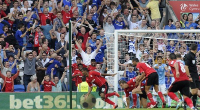 קמפבל חוגג לאחר השער (רויטרס)