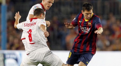 מסי מול הגנת סביליה (רויטרס)