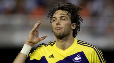 מיצ´ו חוגג את השער נגד ולנסיה (רויטרס) מיצ´ו חוגג את השער נגד ולנסיה (רויטרס)