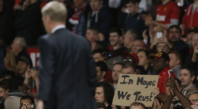 אוהד מביע תמיכה במויס (רויטרס) אוהד מביע תמיכה במויס (רויטרס)