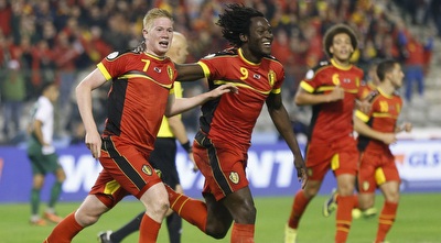 שחקני בלגיה חוגגים (רויטרס)