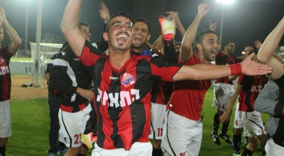 שחקני הפועל חיפה חוגגים (עמית מצפה)