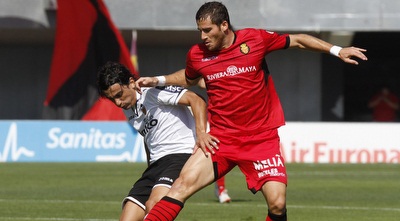 תומר חמד מול דני פארחו (רויטרס)