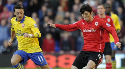 בו קיונג קים מול מסוט אוזיל (רויטרס)