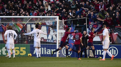 שחקני אוסאסונה חוגגים (רויטרס) שחקני אוסאסונה חוגגים (רויטרס)