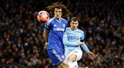 אדין דזקו מול דוד לואיז (רויטרס) אדין דזקו מול דוד לואיז (רויטרס)