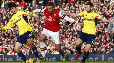 פודולסקי מול בארסלי ויואנג (רויטרס)