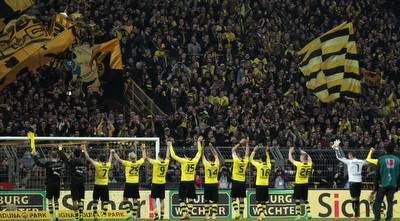 שחקני דורטמונד חוגגים (רויטרס) שחקני דורטמונד חוגגים (רויטרס)