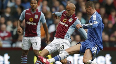 טורס ואל אחמדי במאבק על הכדור (רויטרס)