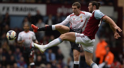 אנדי קארול נאבק בג´ורדן הנדרסון (רויטרס) אנדי קארול נאבק בג´ורדן הנדרסון (רויטרס)