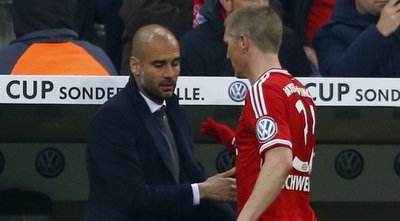 גוארדיולה עם שוויינשטייגר (רויטרס)