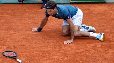 פדרר על החימר. עדיין ללא תואר משמעותי מאז אוגוסט 2012 (רויטרס)