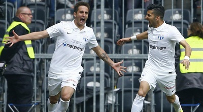 אבי ריקן ומאריו גבראנוביץ´ חוגגים (רויטרס) אבי ריקן ומאריו גבראנוביץ´ חוגגים (רויטרס)