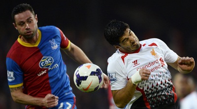 לואיס סוארס נאבק בדילייני  (רויטרס)