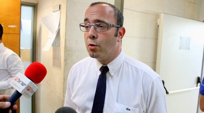 עו&qout;ד מכאל כרמל (משה חרמון)