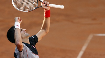 ג´וקוביץ חוגג את ההעפלה לגמר (רויטרס)