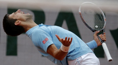 ג´וקוביץ´ ברגע של התרגשות במהלך המשחק מול צ´יליץ´ (רויטרס) ג´וקוביץ´ ברגע של התרגשות במהלך המשחק מול צ´יליץ´ (רויטרס)