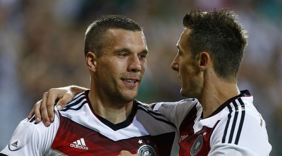 קלוזה ופודולסקי חוגגים (רויטרס)